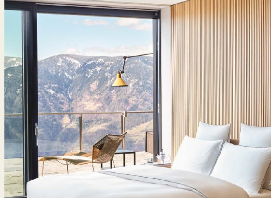 Boutique guest-house bedroom with a mountain view