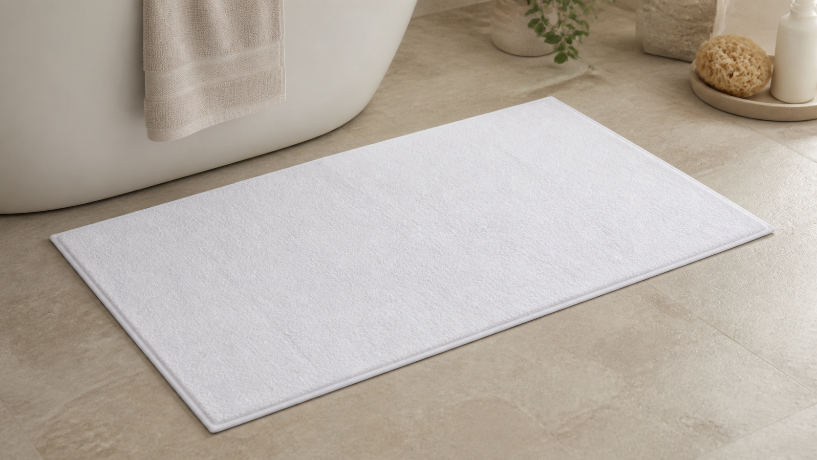 Hospitality bath mat in a bathroom lifestyle scene, distinct from the product photograph